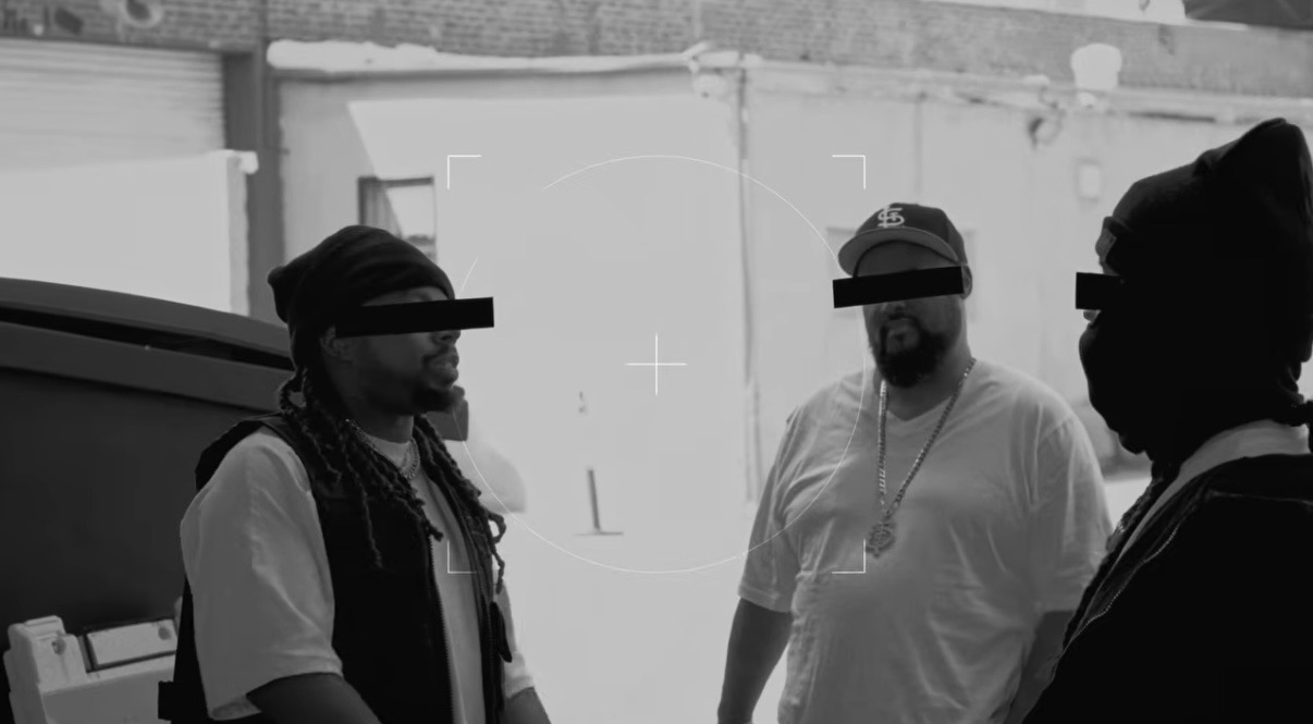 Three figures with black bars over their eyes in a scene from World's Gone Crazy